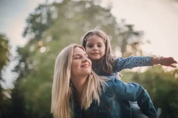 happy mum and daughter following mediation to resolve parental alienation Colchester